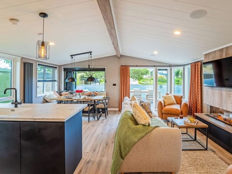 Open plan living space | Coed Aros Lodge, Llanfechell, near Cemaes Bay