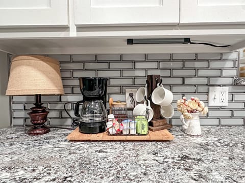Brew your perfect cup at our stylish coffee station.