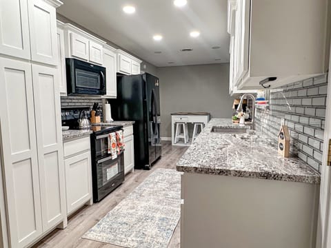 Cook, dine, and gather in this modern, stylish kitchen.
