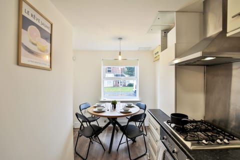 Kitchen has a dining areas for 4 people. 