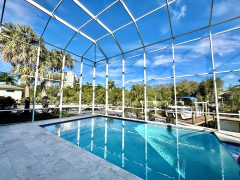 Newly constructed pool, pool lot and pool cage.