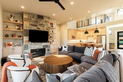 Living room with a gas fireplace and smart TV