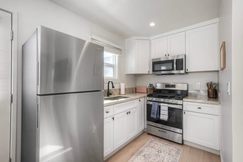 Modern fully stocked kitchen for effortless home cooking.