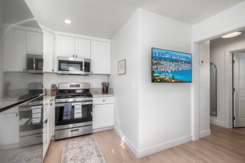 Crisp, clean kitchen ideal for easy vacation meals.