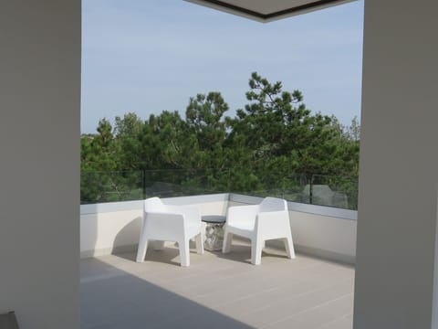 Sky, Building, Shade, Chair, Interior Design, Floor, Tree, Flooring, Composite Material, Real Estate