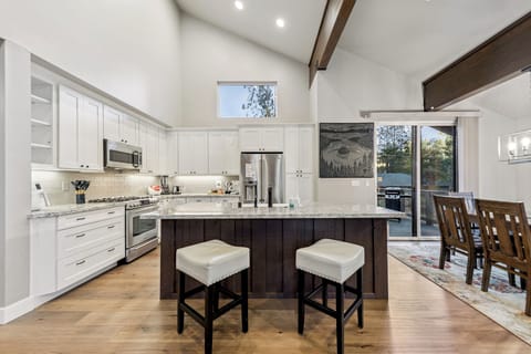 Kitchen with plenty of counter space, perfect for cooking family meals and keeping everyone together.