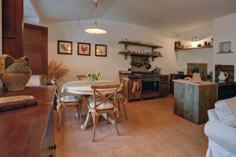 005 Kitchen & Dining from 2nd Bdrm Door 1