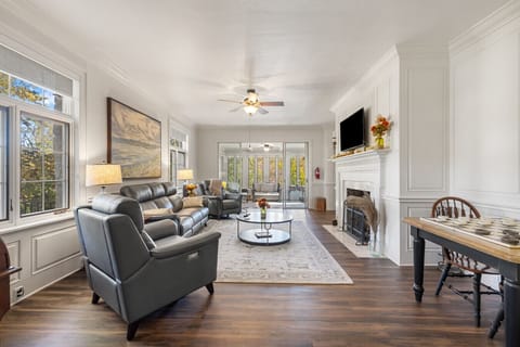 Elegant living room with fireplace | Bright and inviting space | Perfect for relaxation and gatherings