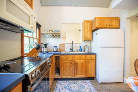 The fully equipped kitchen has everything you'll need to prepare a full thanksgiving dinner or just reheat some quick leftovers. Basic necessities like cooking oil and spices as well as a selection of coffee and tea is provided for our guests.