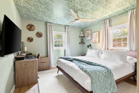 Welcome Home! The main level king offers a full closet, plug and pay work station, smart tv, blackout shades curtains and a sound machine and lamp lighting.