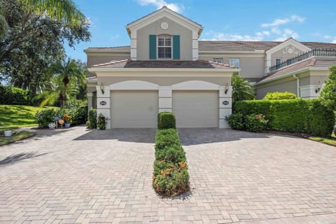 Beautiful paver driveway with a one car garage