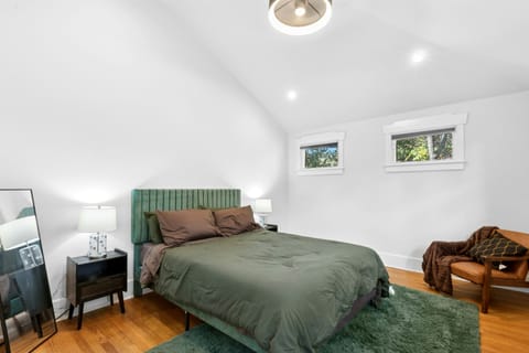 room 6 has a queen bed, sitting area, floor mirror, new built ensuite roman bath and shower