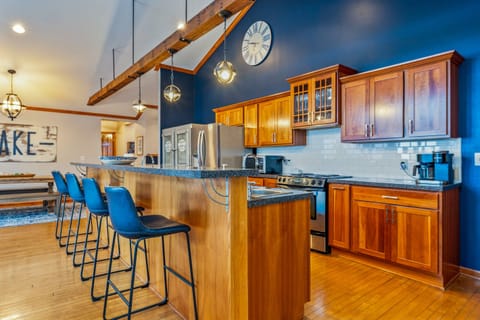 Open concept kitchen dining and living space to stay connected with family while preparing meals