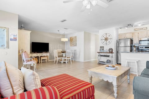 Open concept living space with coastal decor.