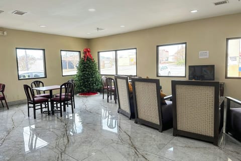 Relax by the windows in this open, sunlit lounge.