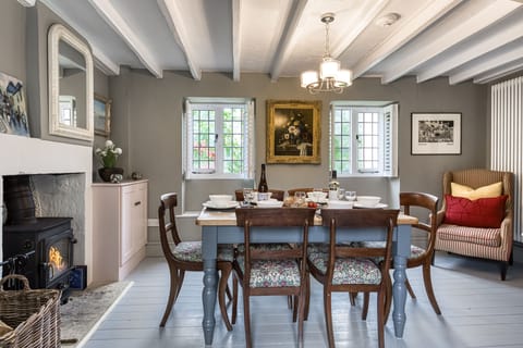 First floor: Cosy dining room with a wood burning stove