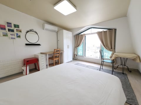 Bedroom A - Queen size bed
Table, wardrobe, terrace, air conditioner 