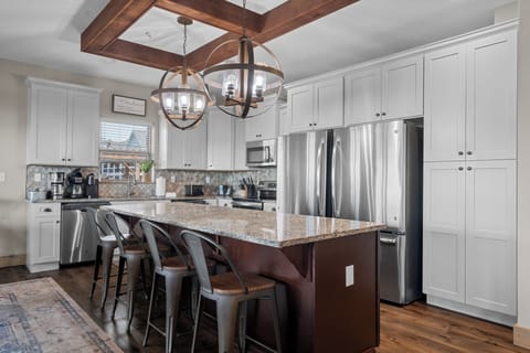 This kitchen is a chef's dream, complete with two refrigerators and dishwashers