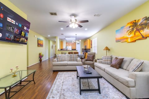 Bright and inviting living space with plenty of seating for the whole group.