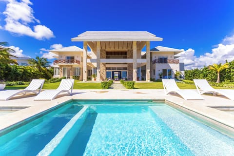 Oceanfront villa with golf and sea views.