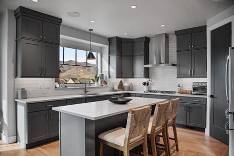 The kitchen is large with a generous island, bar seating and juts about every amenity you could need to prepare a large meal for your group