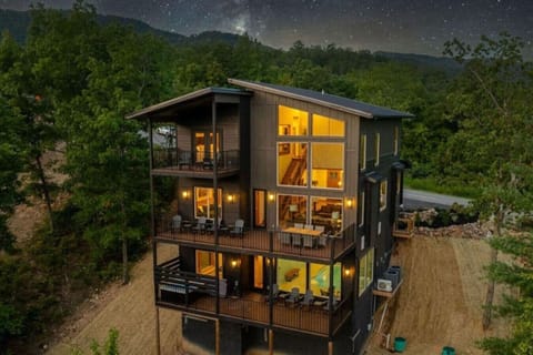 Expansive windows and layered decks invite you to soak in the scenery from every floor. Whether you’re sipping coffee at sunrise or unwinding after dark, the mountains are always in sight.