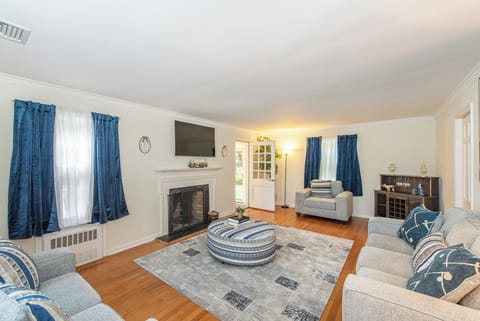 Cozy up and relax in the spacious living room with a smart TV during your stay.