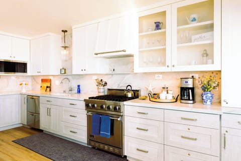 This new kitchen is completely stocked with everything you need for cooking.  