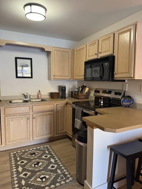 Kitchen with Oven/Range, Microwave and Keurig
