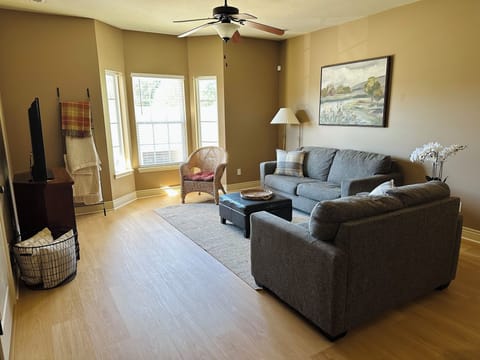 Living Room with natural light and large TV