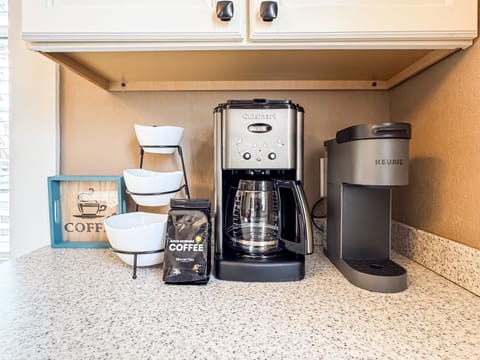 The spacious kitchen has all new appliances and everything you need, including your choice of coffee brewing: drip, Keurig, or French press at Aussie Cottage.
