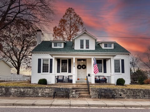 Over a century old, Aussie Cottage has been updated to modern conveniences, adding a beautiful charm to this brick home that is close to Purina Farms, wineries, Katy Trail, weddings and downtown WashMo events and restaurants.