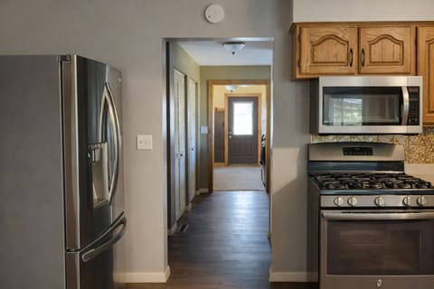 A simple, functional kitchen space that keeps everything within reach. Whether you are preparing a full meal or a quick snack, this area is designed for ease and comfort during your stay.