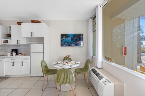 Cozy four-seater dining table perfect for shared meals.