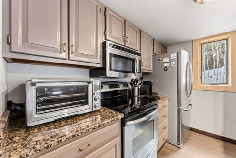 Kitchen: Espresso machine, Keurig, air fryer, blender, kettle, food processor, cooking utensils, tableware