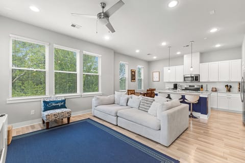 Contemporary seating area featuring cozy furnishings and warm accents for ultimate comfort.