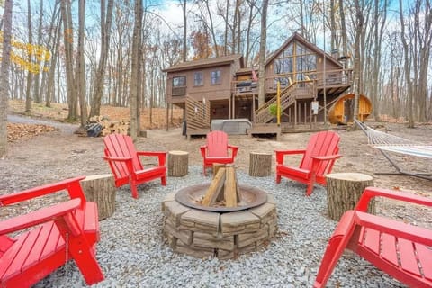 Spacious outdoor fire-pit area with vibrant seating, ideal for s’mores and starry nights.