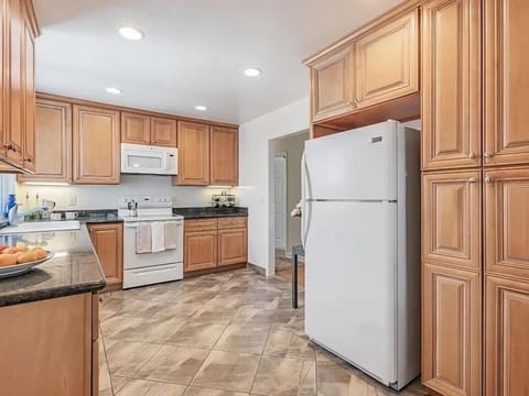 Fully-equipped kitchen · Hot water kettle · Nespresso machine · Re Freezer · Stove/Oven/Microwave · Dishwasher · Dishes and silverware · Coffee mugs and glass cups · Pots and cooking basics