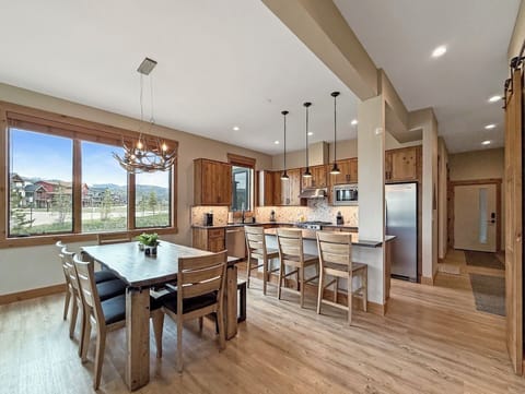 We have ample dining space at the table and island, plus a fully stocked kitchen