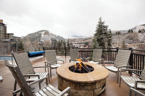 Gather around the community fire pit take in stunning views of Beaver Creek's world-famous ski slopes