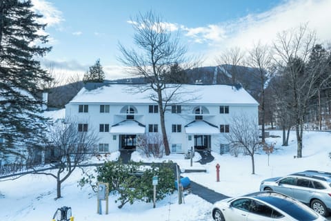 Your winter mountain retreat awaits! Imagine cozy evenings in this snow-covered condo, where towering pines frame your peaceful sanctuary and the crisp mountain air fills your lungs with pure tranquility.