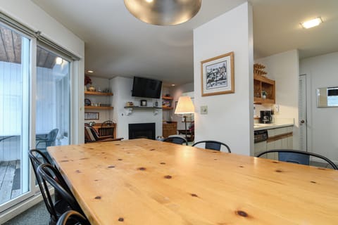 Share meals and memories in a dining space open to the living area and kitchen.