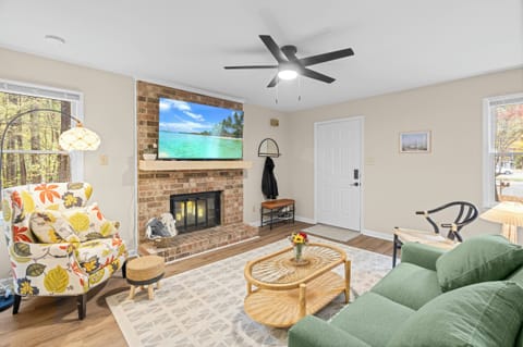 Living room with 65" TV with Dolby Atmos Surround Sound