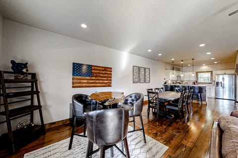 Gather around a rustic table for memorable meals in this stylish, inviting space!