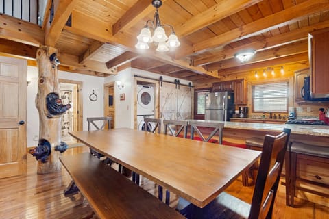 Fully equipped cabin kitchen with granite countertops, stainless appliances, and plenty of space. Ideal for cooking meals on your Smoky Mountain vacation, family getaway, or long weekend retreat.