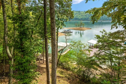 Serene Lakeside Escape. And, revel in stunning water views and nature's embrace at your getaway.