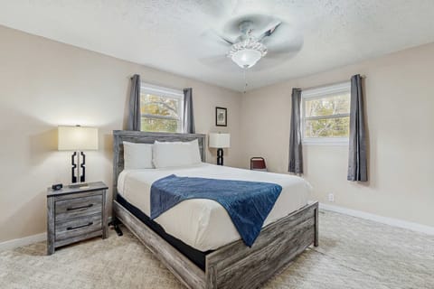 Relax in a stylish, sunlit room with inviting decor and modern comforts!