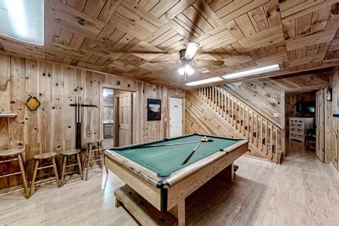 Game Room, challenge friends to a fun night of pool in this wood-paneled retreat!
