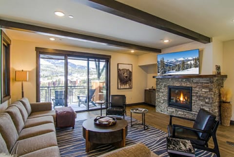 Living Room: Sectional sofa, 60” Samsung Smart TV, gas fireplace, mountain views, deck access