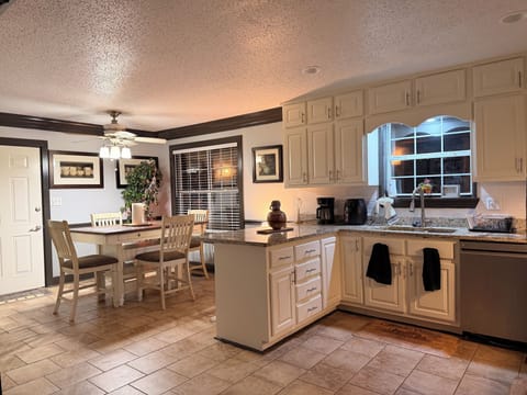 Full kitchen stocked with basic essentials for your stay.